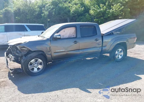 2015 Toyota Tacoma Base V6 из США, поврежденный, VIN 3TMMU4FN5FM082376